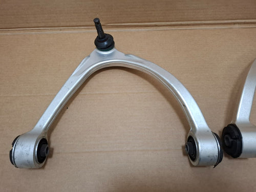 Front Upper Control Arms for a Lexus LS430 (2001–2006)
